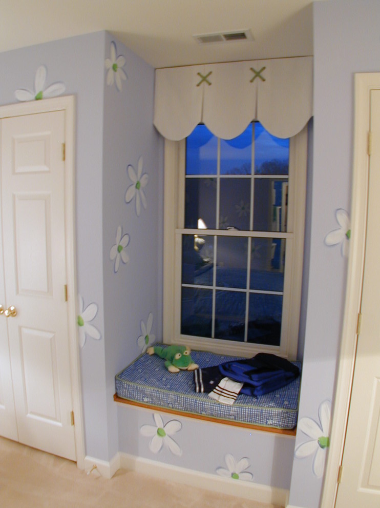 Design ideas for a traditional kids' room in DC Metro with blue walls.