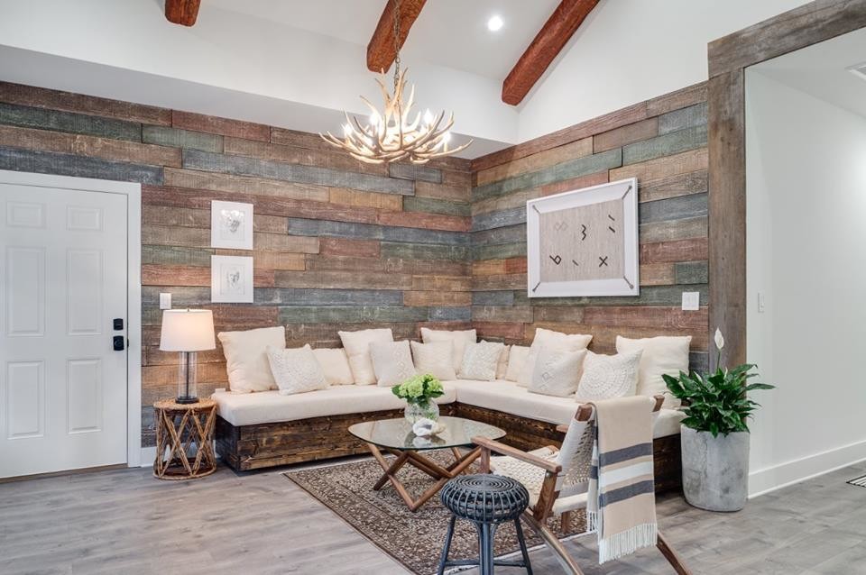 Inspiration for a large transitional open concept vinyl floor living room remodel in Kansas City with multicolored walls, no fireplace and no tv