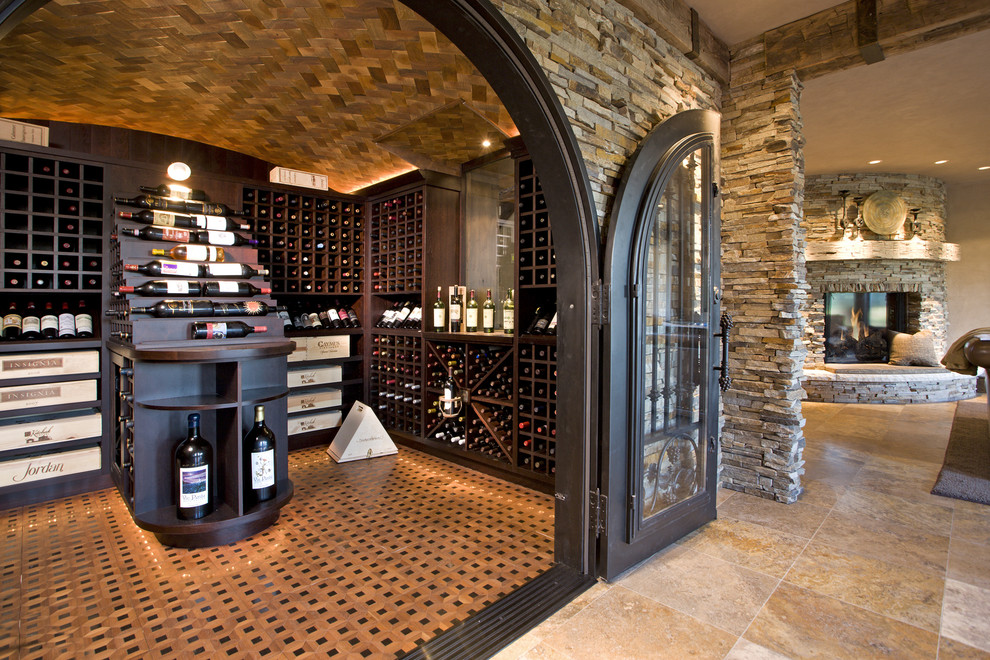 Country wine cellar in Minneapolis with display racks and orange floor.
