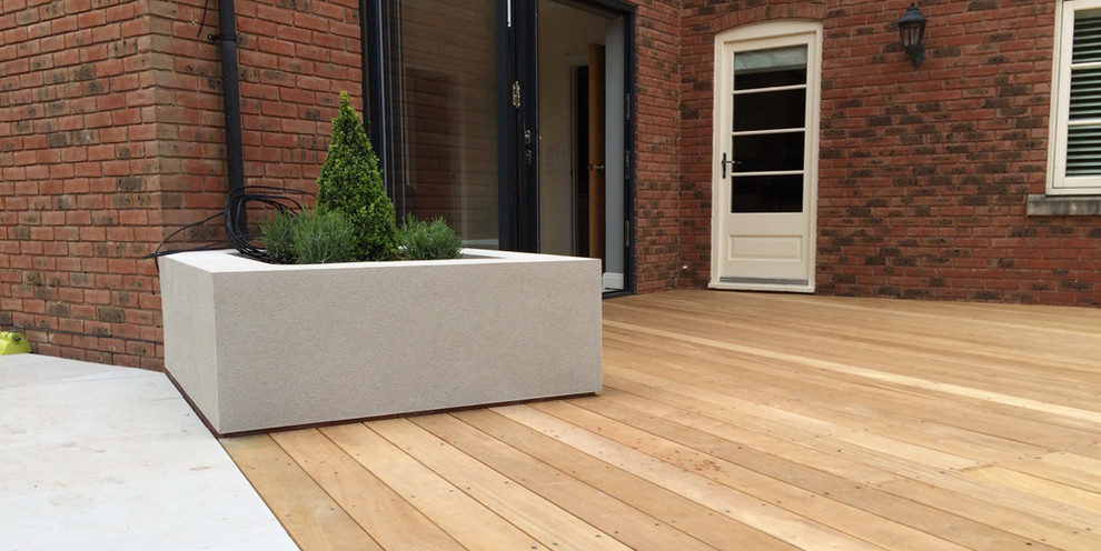 Design ideas for a large contemporary backyard garden in Cheshire with decking.