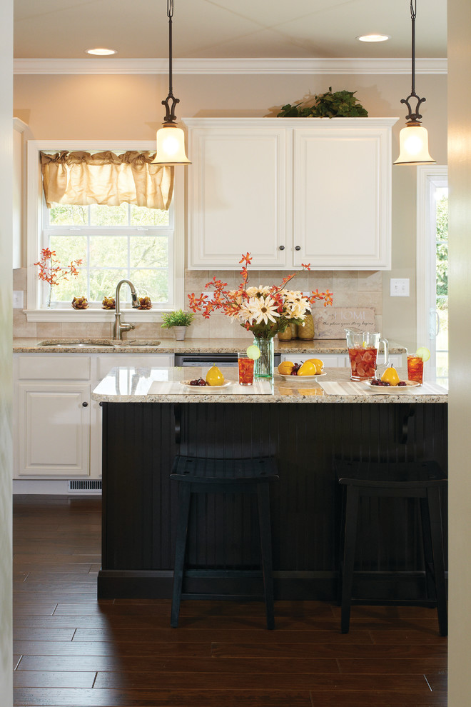 Inspiration for a transitional dark wood floor kitchen remodel with a double-bowl sink, granite countertops, beige backsplash and an island