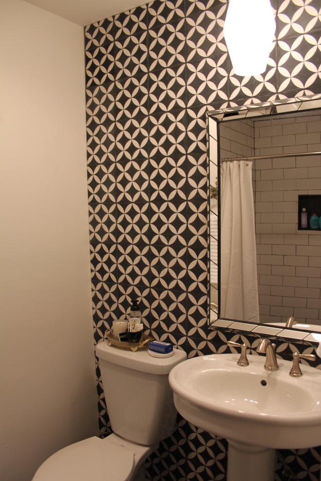 Inspiration for a transitional master black and white tile and cement tile alcove shower remodel in Dallas with multicolored walls and a pedestal sink