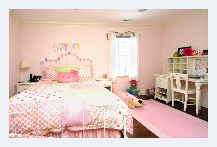 Example of a transitional bedroom design in Miami