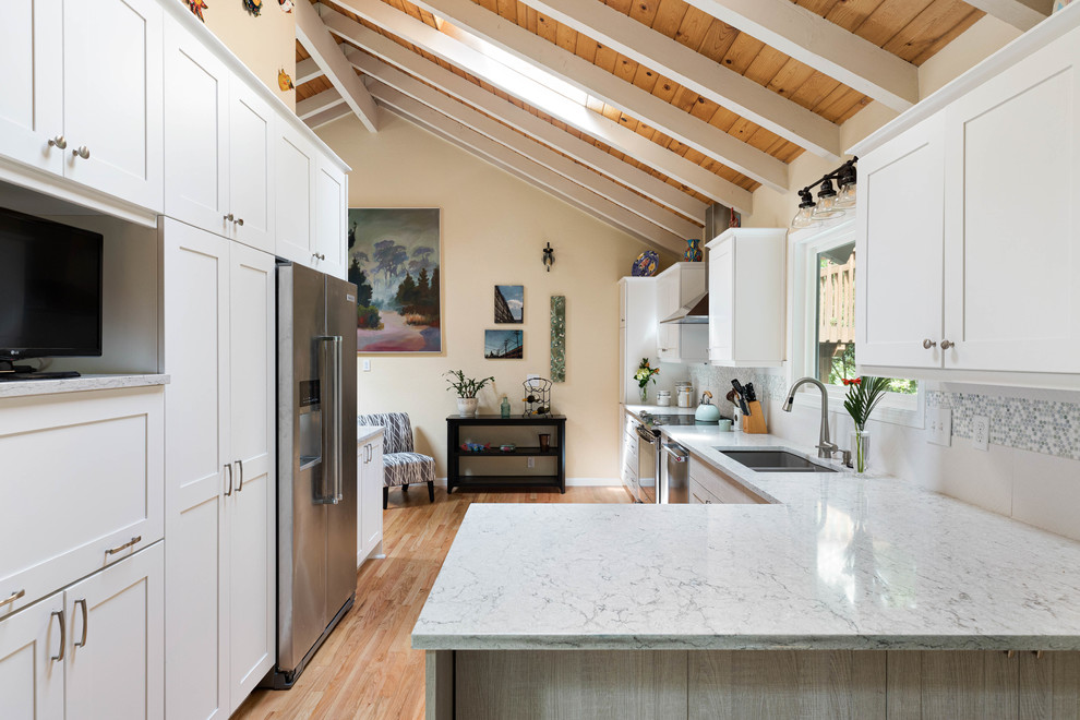 Example of a transitional kitchen design in Seattle