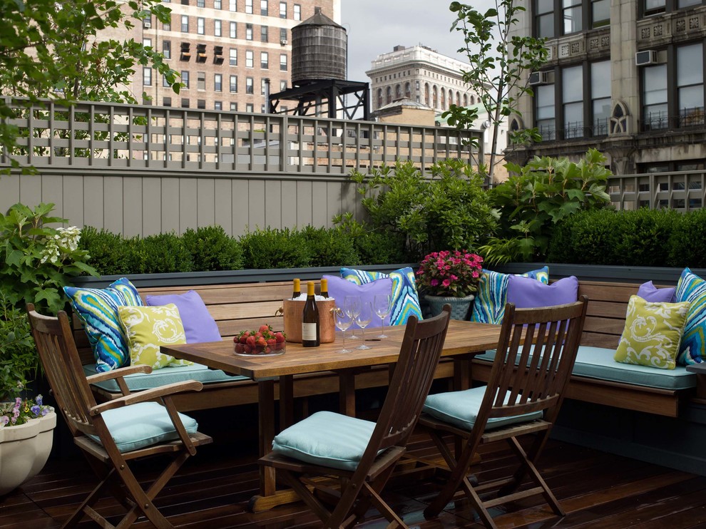 Photo of a transitional rooftop and rooftop deck in New York with no cover.