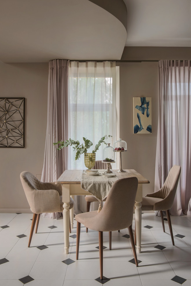 Design ideas for a contemporary dining room in Moscow with beige walls.