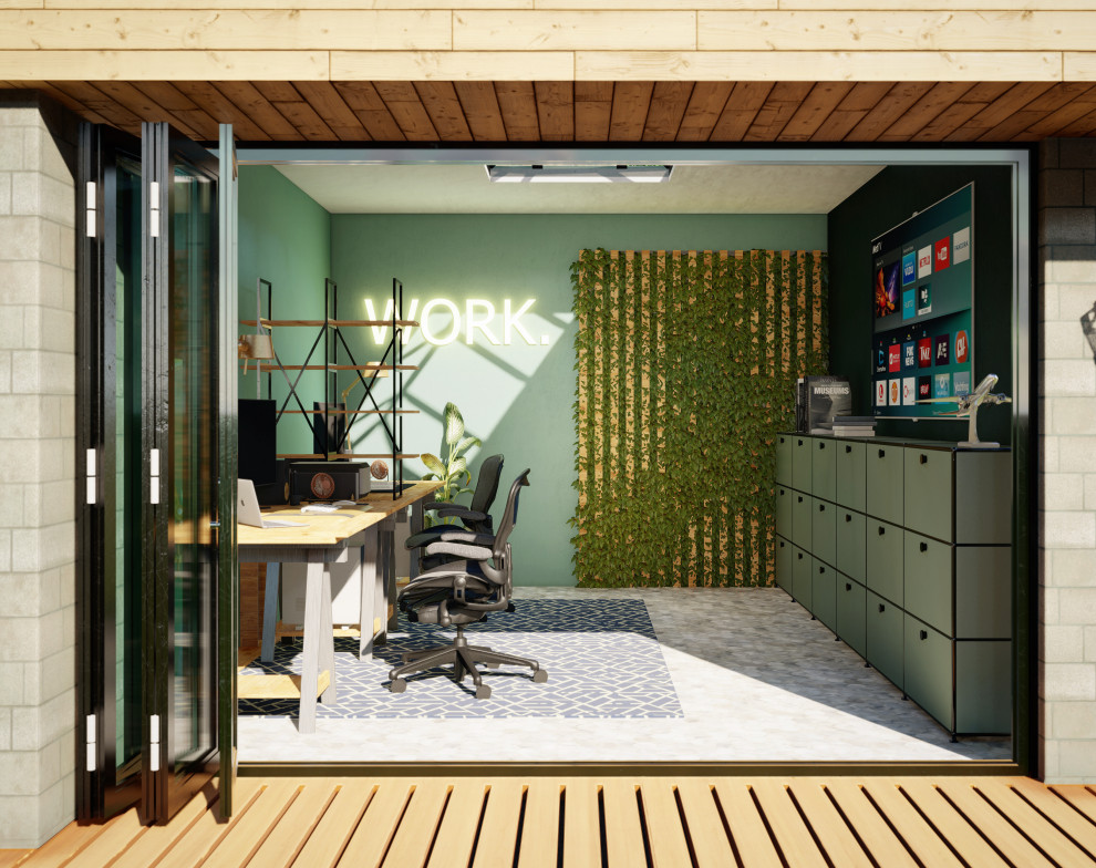 Home studio - small contemporary freestanding desk concrete floor, gray floor and wallpaper home studio idea in Manchester with green walls