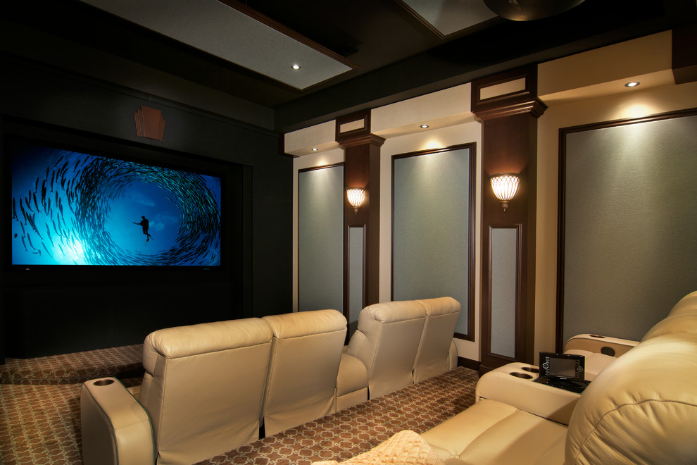This is an example of a large transitional home theatre in Miami.
