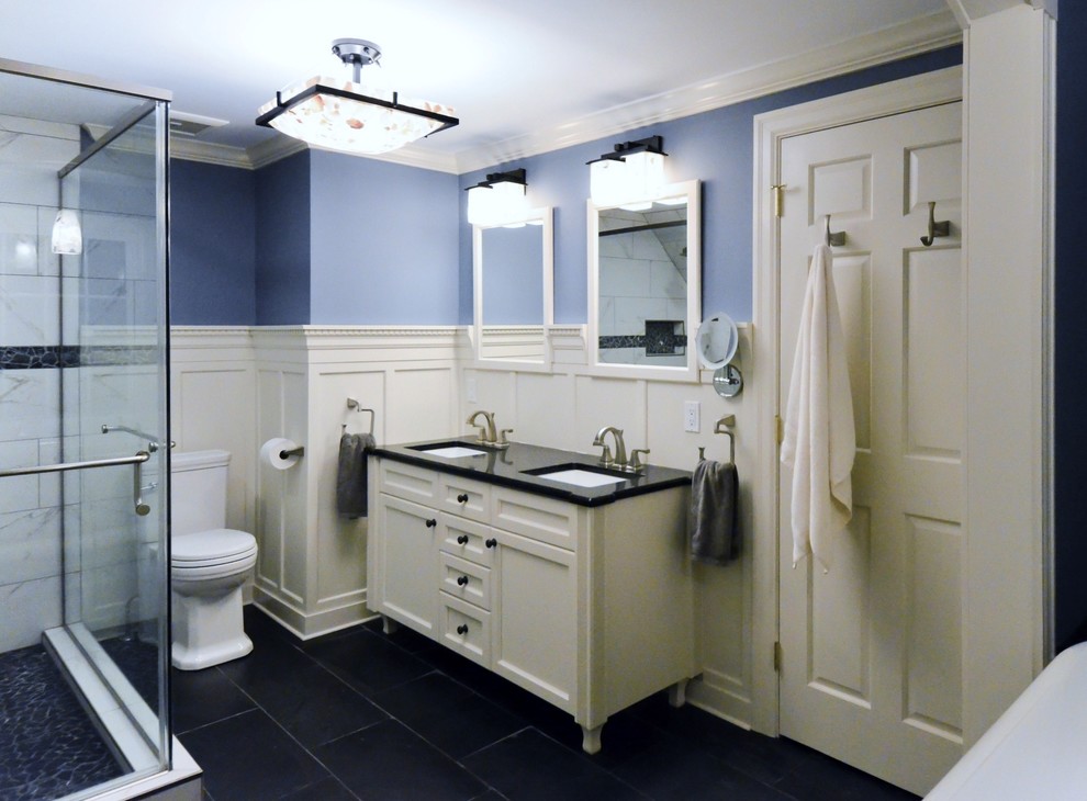 Mid-sized transitional master bathroom in Other with shaker cabinets, white cabinets, a freestanding tub, a corner shower, a two-piece toilet, purple walls, porcelain floors, an undermount sink, grey floor and a hinged shower door.