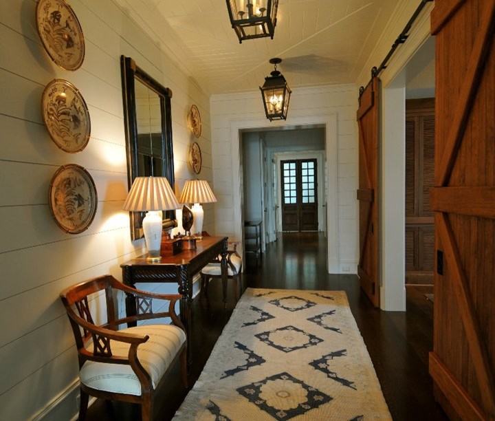 Photo of a beach style entryway in Charleston.