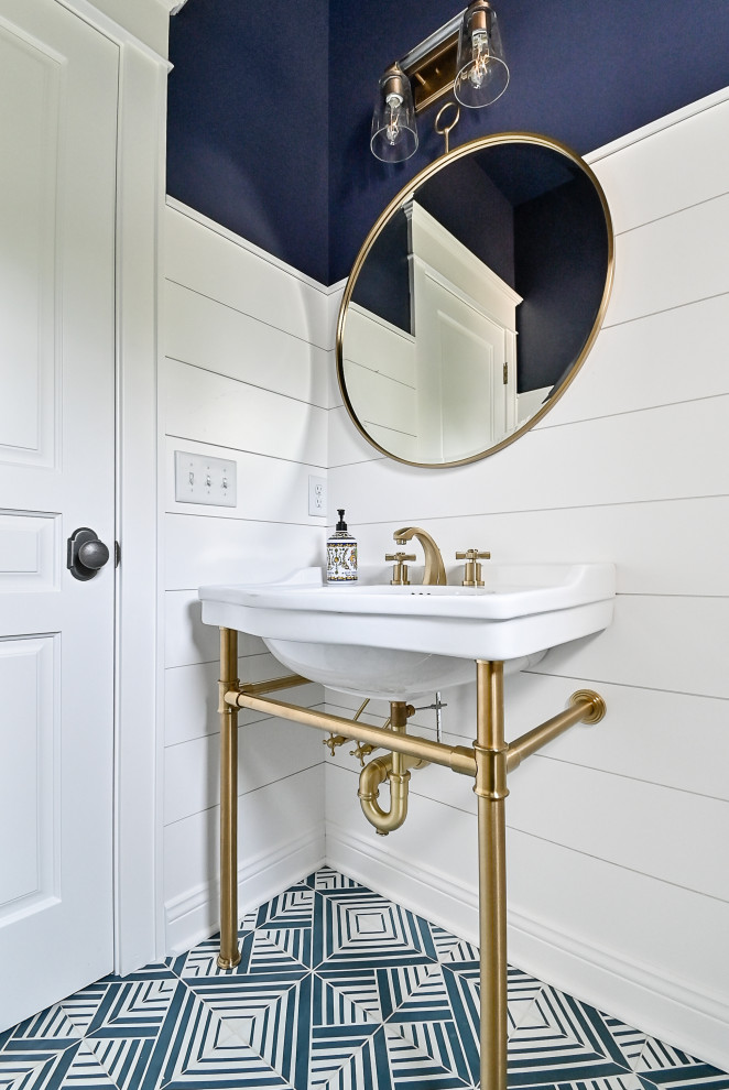 Powder room - small coastal cement tile floor, blue floor and shiplap wall powder room idea in Milwaukee with blue walls, a console sink and a freestanding vanity