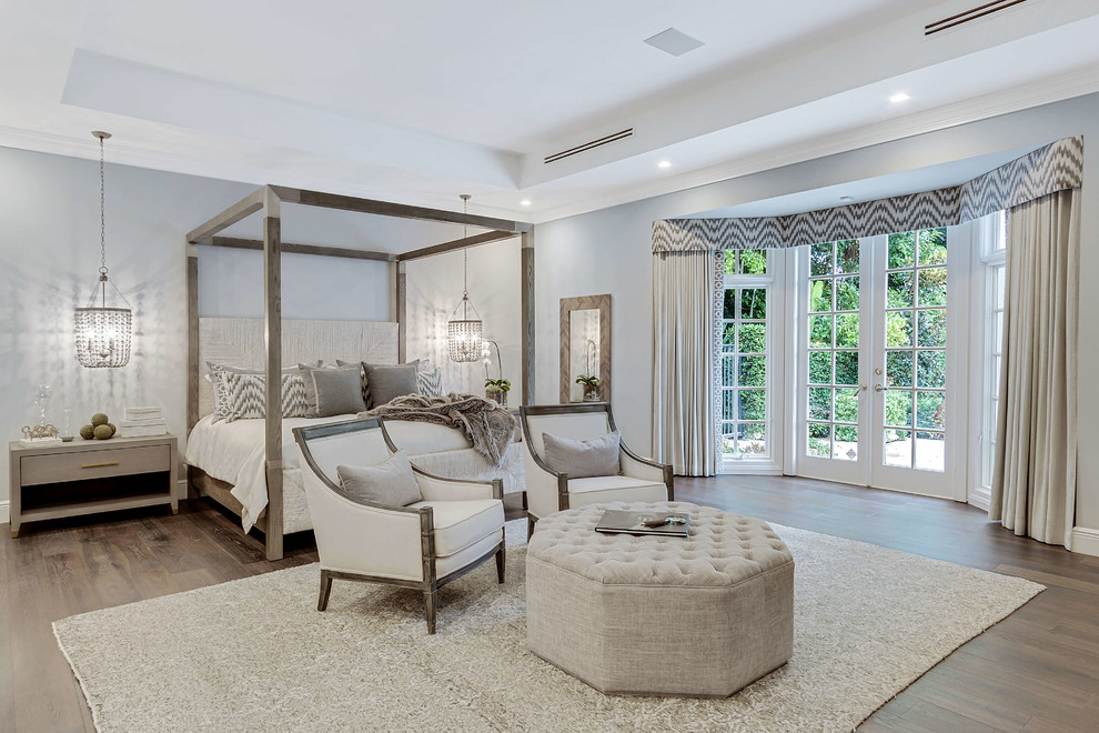 Inspiration for a transitional master bedroom in Miami with grey walls, dark hardwood floors and brown floor.