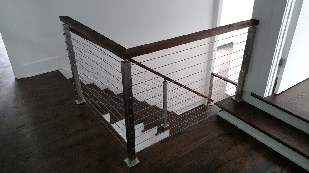 Design ideas for a mid-sized contemporary u-shaped staircase in Atlanta.