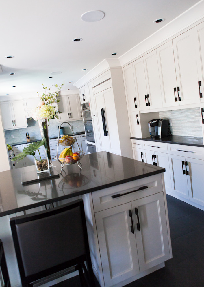 Example of a transitional kitchen design in Toronto