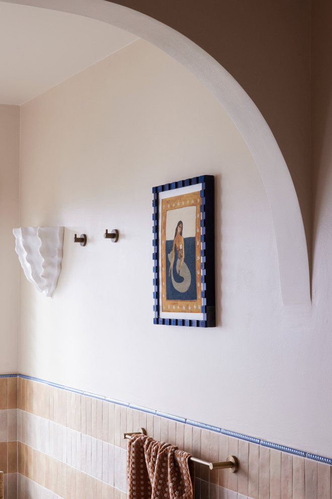 Design ideas for a large mediterranean master bathroom in Sydney with flat-panel cabinets, beige cabinets, a freestanding tub, an open shower, a wall-mount toilet, multi-coloured tile, ceramic tile, beige walls, mosaic tile floors, a vessel sink, quartzite benchtops, multi-coloured floor, an open shower, beige benchtops, an enclosed toilet, a single vanity, a freestanding vanity and recessed.