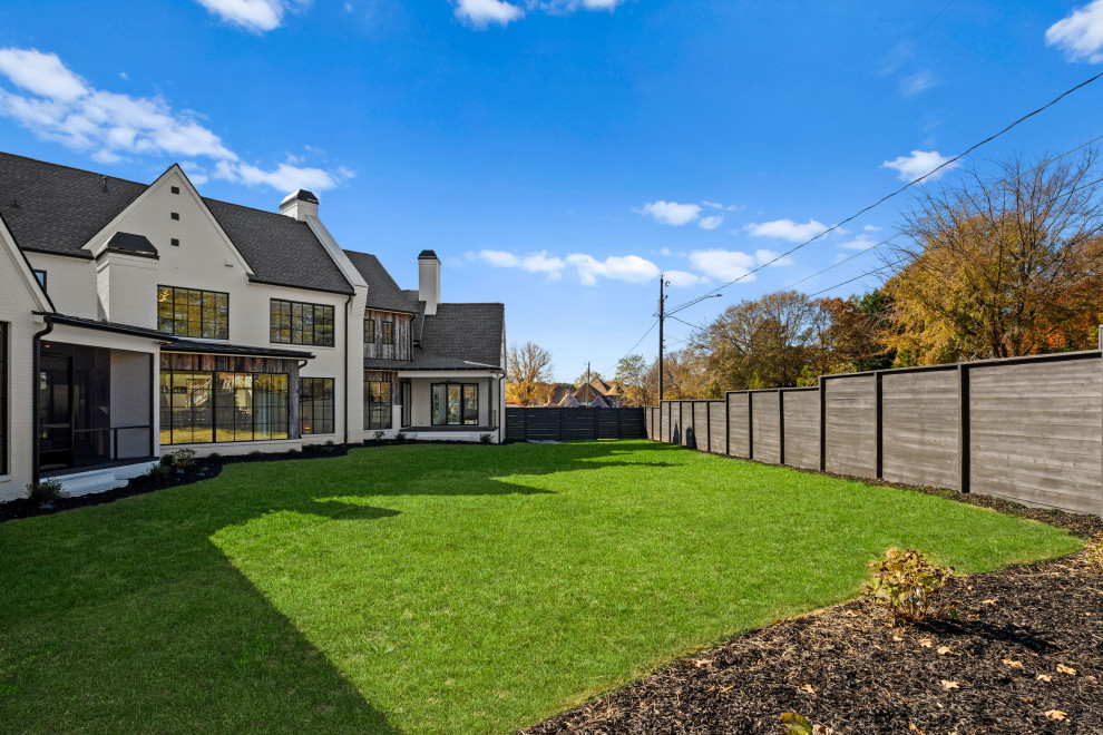 Example of a transitional home design design in Charlotte