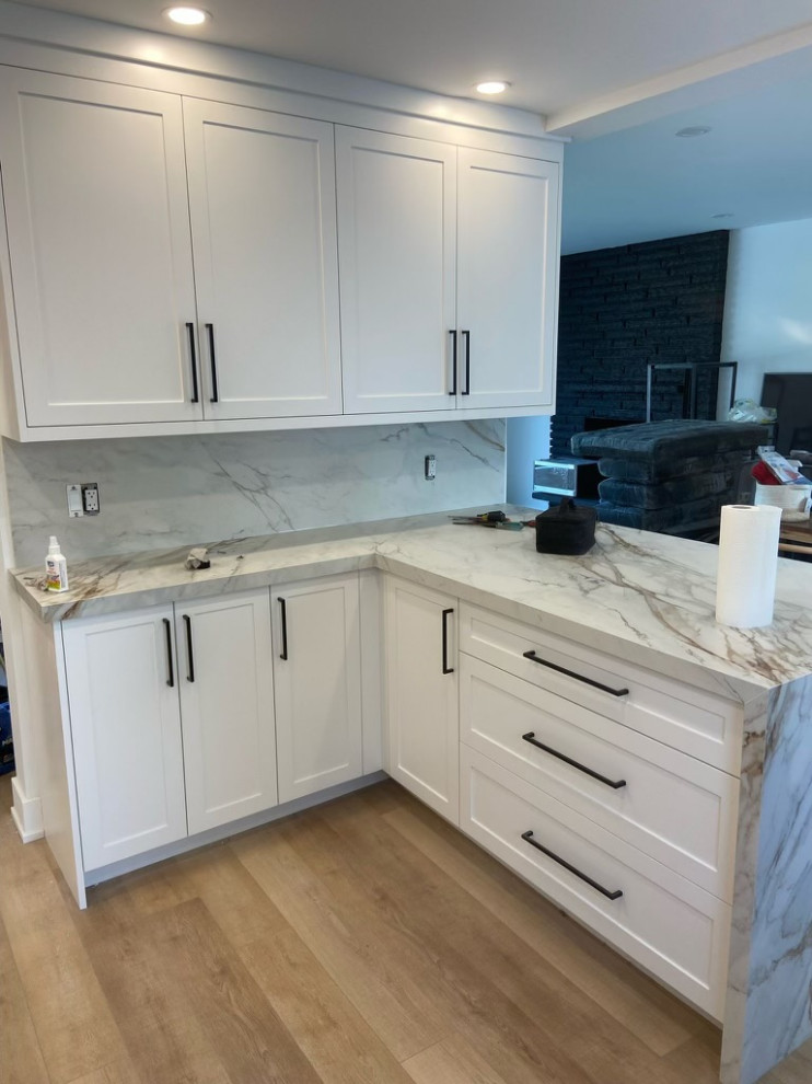 Example of a minimalist home design design in Toronto