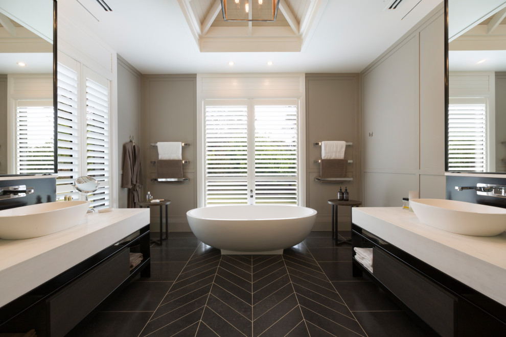 Inspiration for a large contemporary master bathroom in Melbourne with a freestanding vanity.