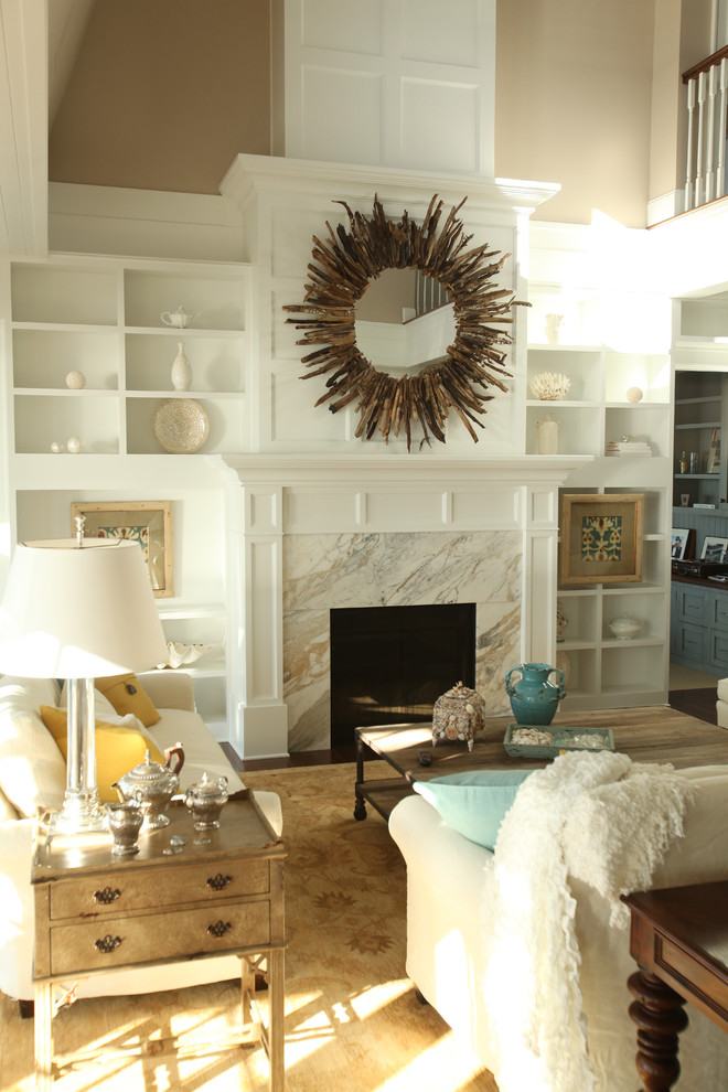 Inspiration for a transitional living room in Seattle with beige walls and a standard fireplace.