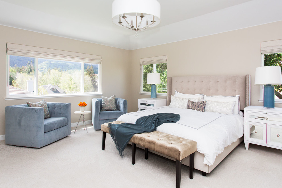 Photo of a large transitional master bedroom in San Francisco with beige walls, carpet, no fireplace and beige floor.