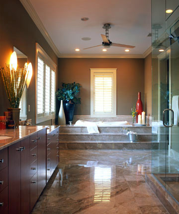 This is an example of a large contemporary master bathroom in Charleston with dark wood cabinets, an alcove tub, a corner shower, an undermount sink, a hinged shower door, beige benchtops, a double vanity and a built-in vanity.