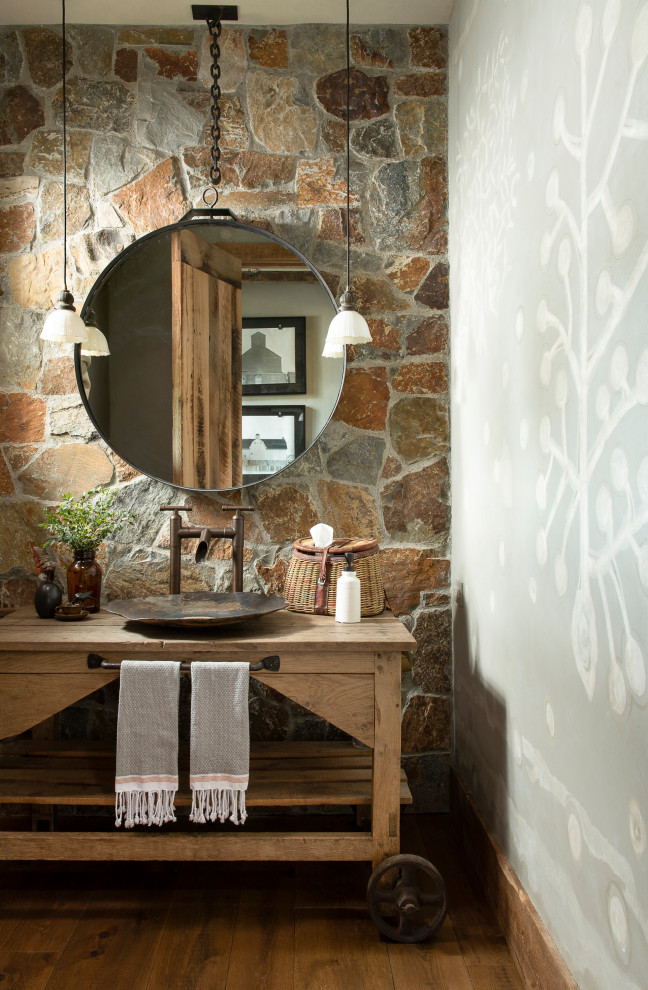 Inspiration for a rustic medium tone wood floor bathroom remodel with light wood cabinets, a vessel sink, wood countertops and open cabinets