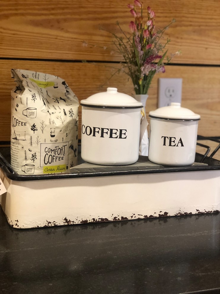 Inspiration for a mid-sized rustic kitchen remodel with a farmhouse sink, quartzite countertops and white countertops