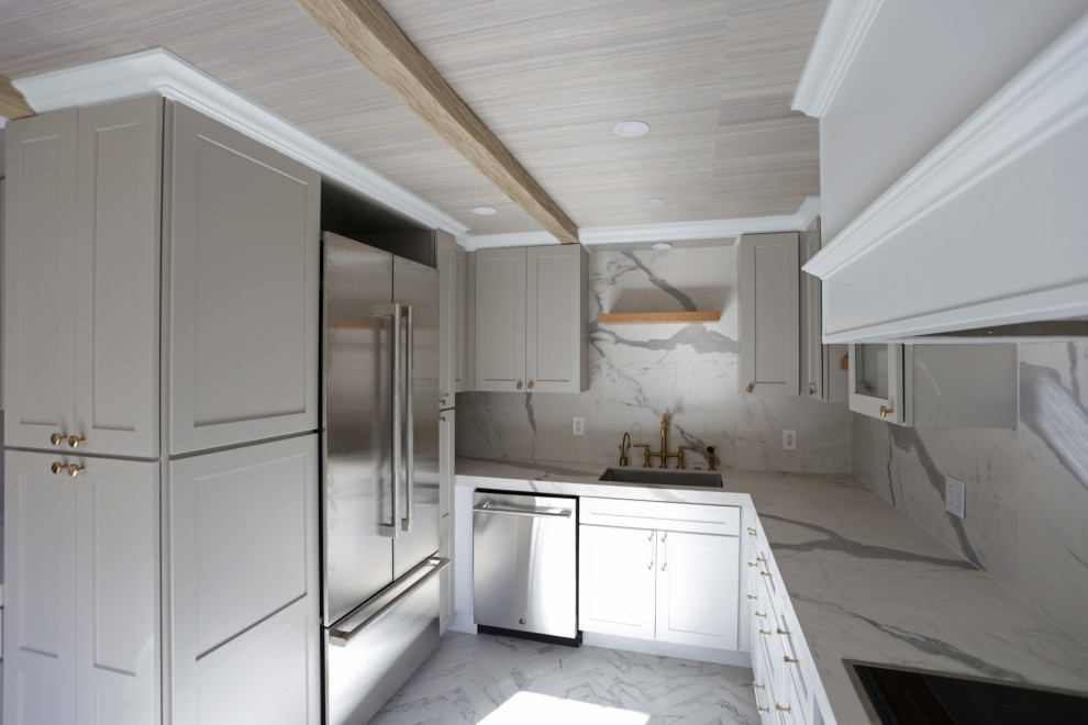 Kitchen - mid-sized transitional l-shaped marble floor, white floor and exposed beam kitchen idea in DC Metro with an undermount sink, shaker cabinets, white cabinets, quartzite countertops, white backsplash, quartz backsplash and stainless steel appliances