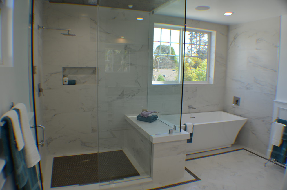 Mid-sized transitional master bathroom in Los Angeles with raised-panel cabinets, white cabinets, a freestanding tub, an alcove shower, a one-piece toilet, white tile, marble, white walls, marble floors, an undermount sink, soapstone benchtops, white floor, a hinged shower door and brown benchtops.