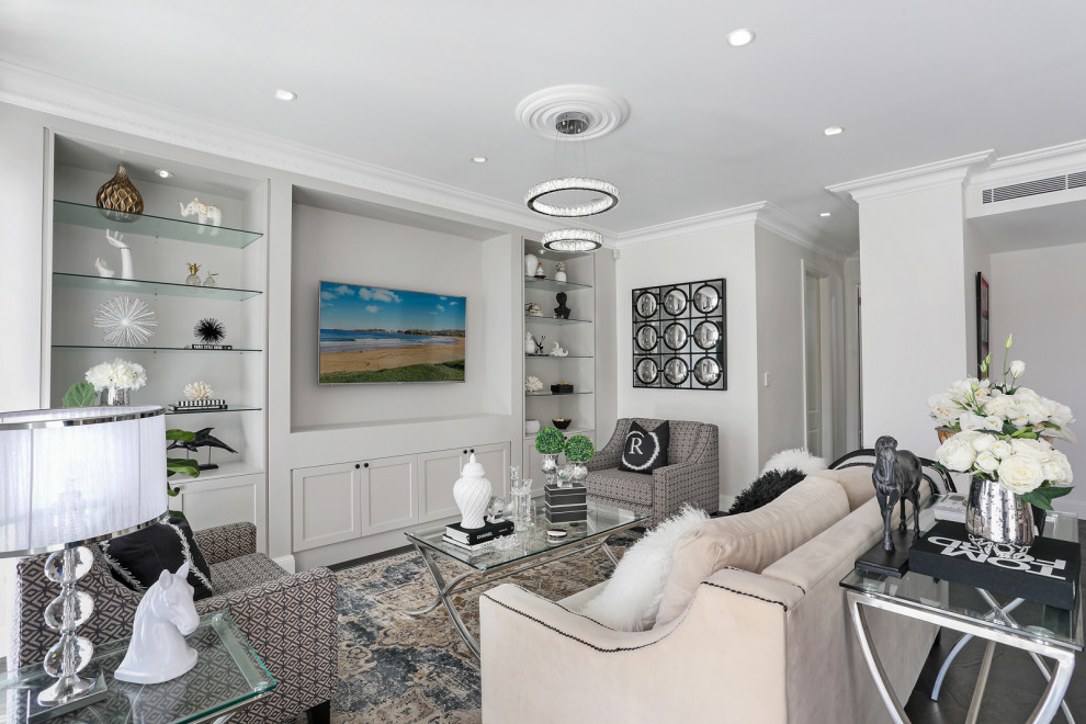 Photo of a transitional open concept family room in Sydney with white walls.