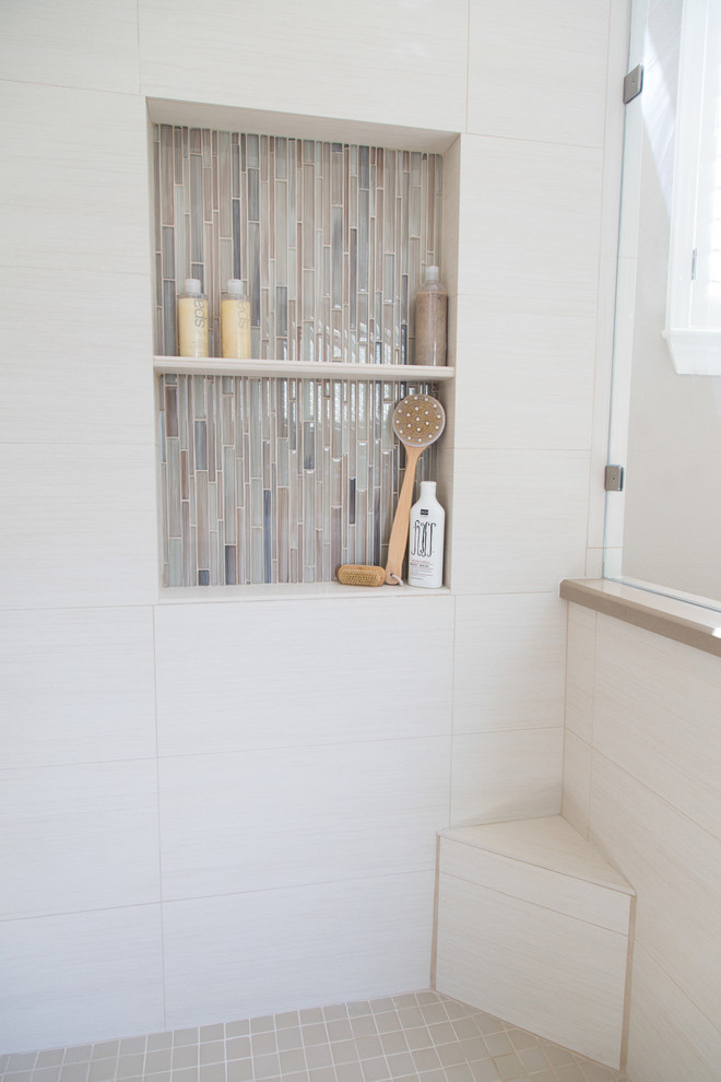 Inspiration for a mid-sized transitional master beige tile and glass sheet bathroom remodel in Houston