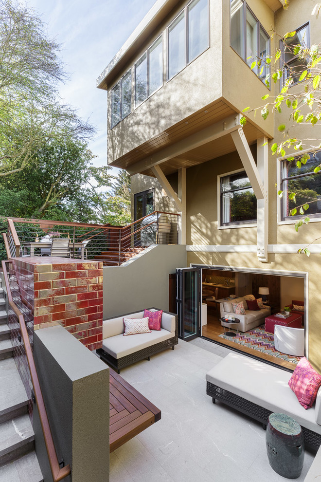 This is an example of a contemporary backyard patio in San Francisco with no cover.