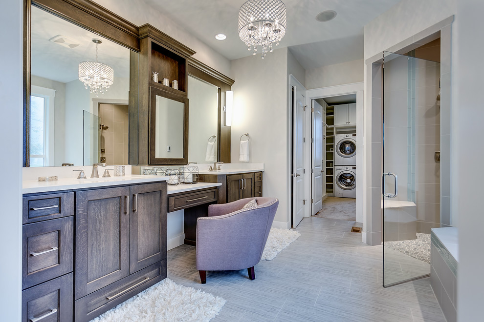 Design ideas for a large transitional master bathroom in Portland with recessed-panel cabinets, dark wood cabinets, a corner tub, a double shower, a two-piece toilet, gray tile, porcelain tile, grey walls, porcelain floors, an undermount sink and engineered quartz benchtops.