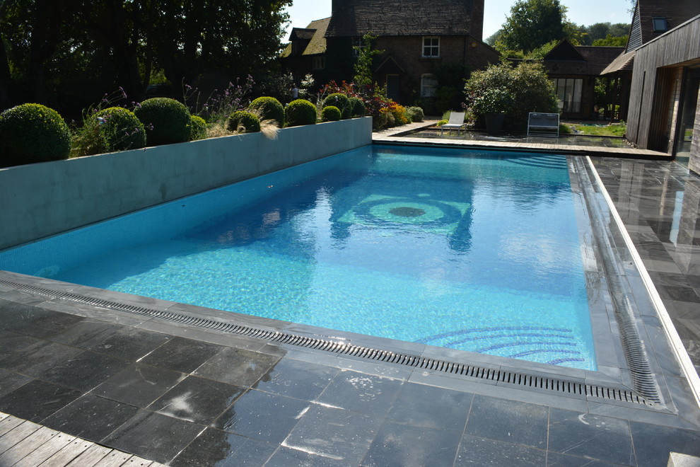 Design ideas for a traditional pool in Hampshire.