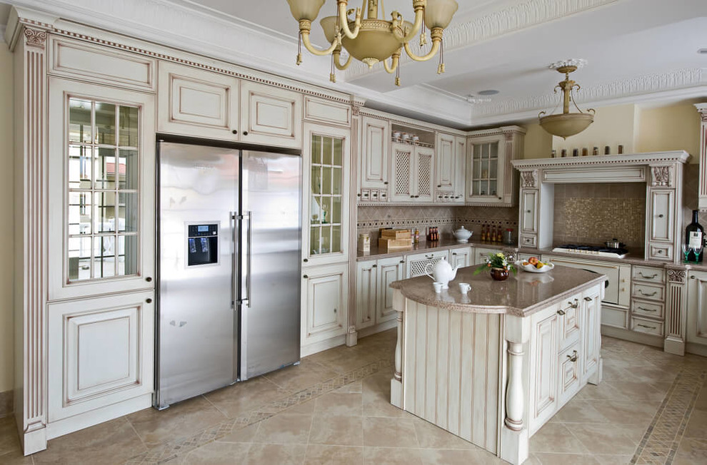 Kitchen - u-shaped ceramic tile kitchen idea with an undermount sink and an island