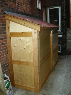 small storage shed with sliding door - contemporary