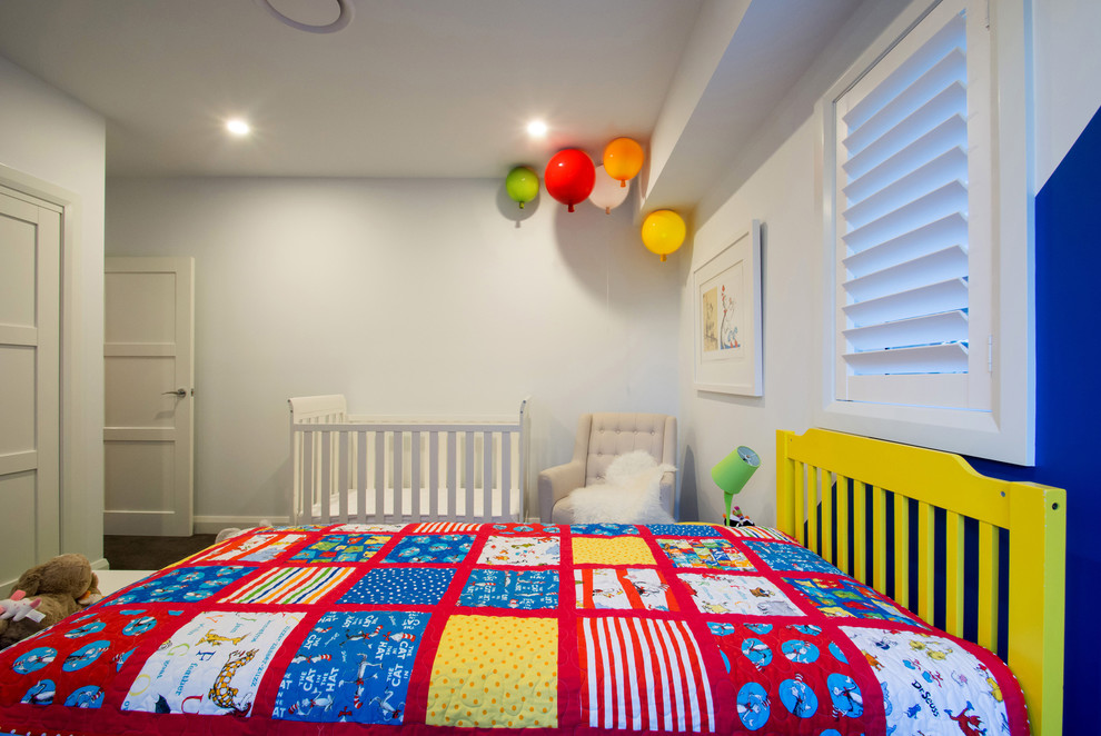 Inspiration for a mid-sized contemporary gender-neutral kids' bedroom in Sydney with blue walls.