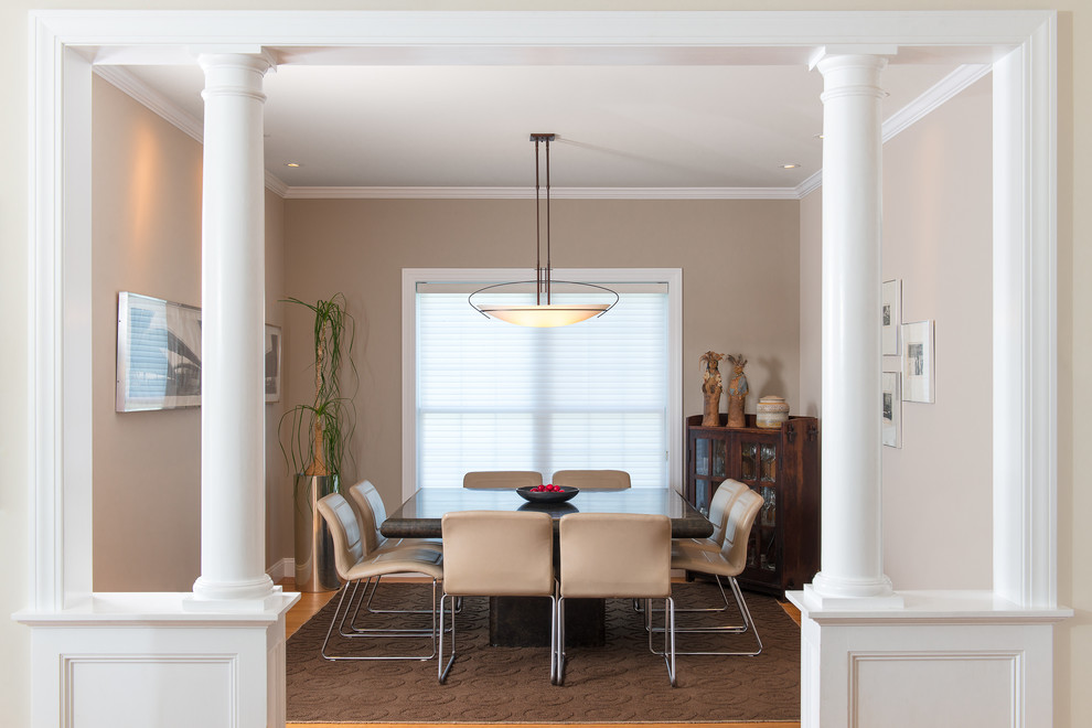 Mid-sized contemporary separate dining room in Burlington with beige walls and light hardwood floors.