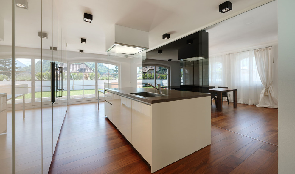 Contemporary kitchen in Other with with island.