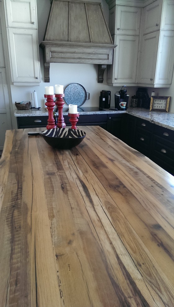 Eclectic l-shaped medium tone wood floor open concept kitchen photo in Toronto with recessed-panel cabinets, distressed cabinets, wood countertops and an island