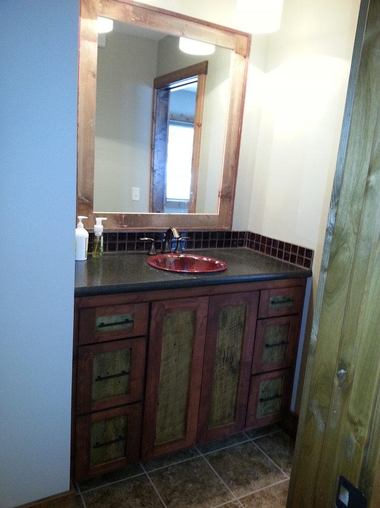 Photo of a small country 3/4 bathroom in Minneapolis with shaker cabinets, medium wood cabinets, an open shower, a two-piece toilet, multi-coloured walls, ceramic floors, a vessel sink and granite benchtops.