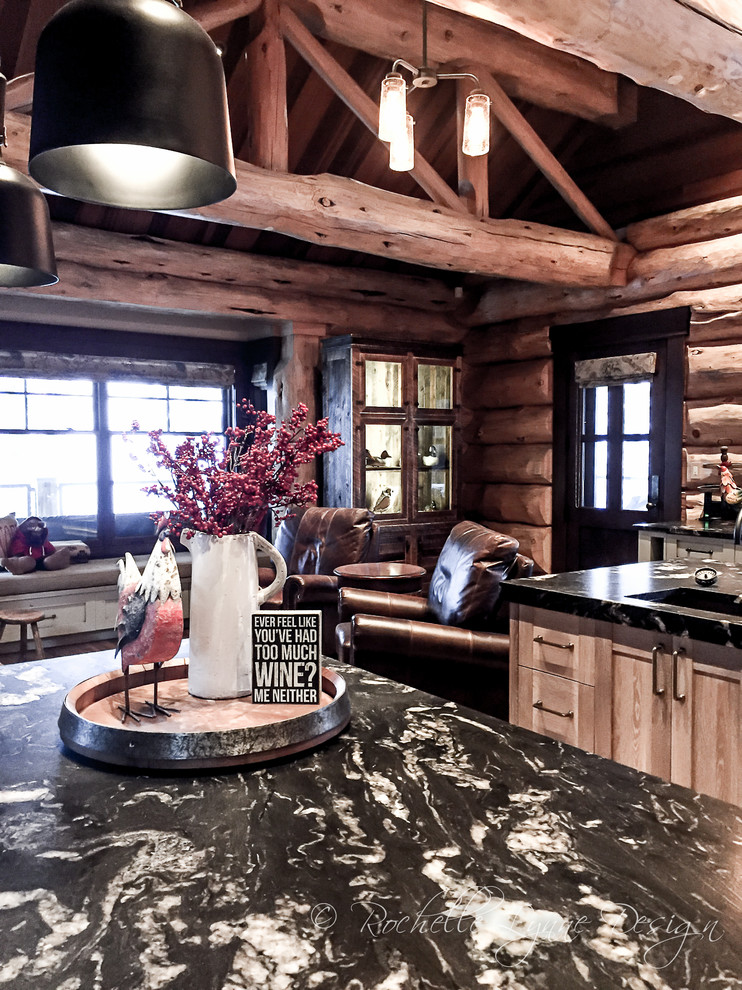 Open concept kitchen - rustic l-shaped medium tone wood floor open concept kitchen idea in Calgary with shaker cabinets, distressed cabinets, granite countertops, two islands and an undermount sink