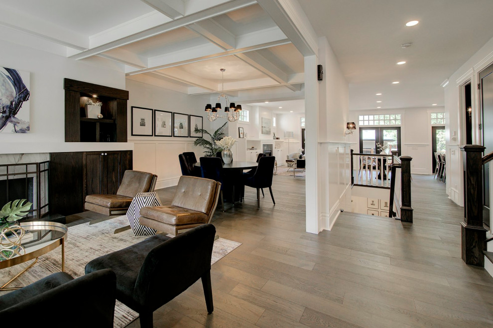 Example of a transitional home design design in Calgary
