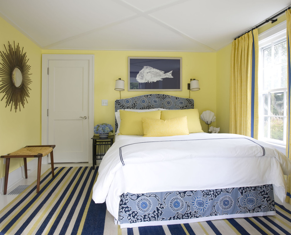 Design ideas for an eclectic bedroom in New York with yellow walls.