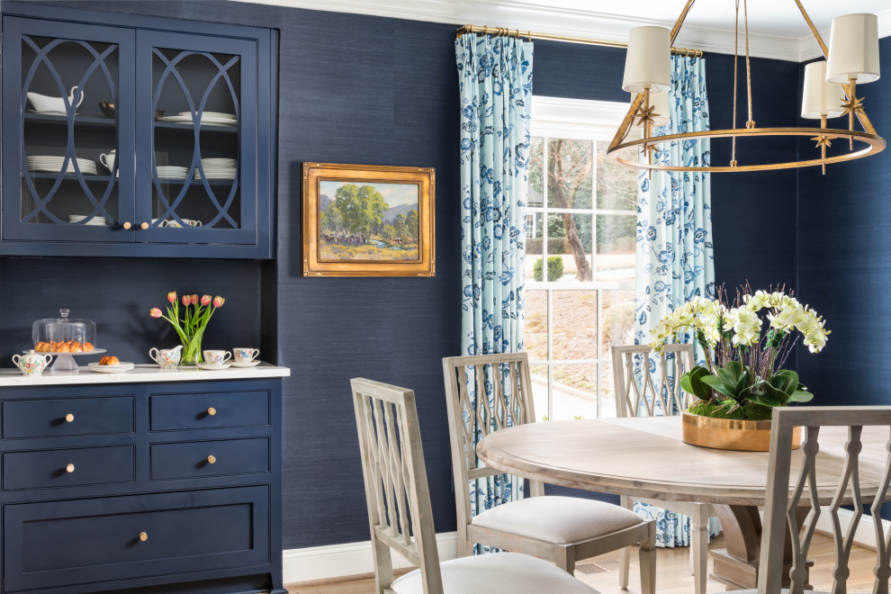Dining room - transitional dining room idea in Atlanta with blue walls