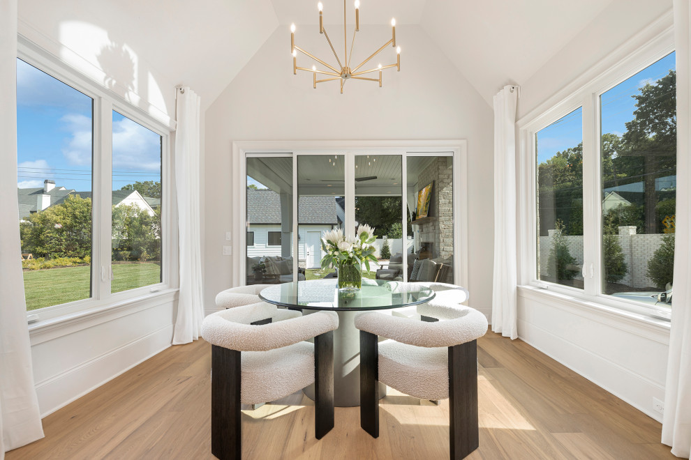 Example of a transitional dining room design in Charlotte