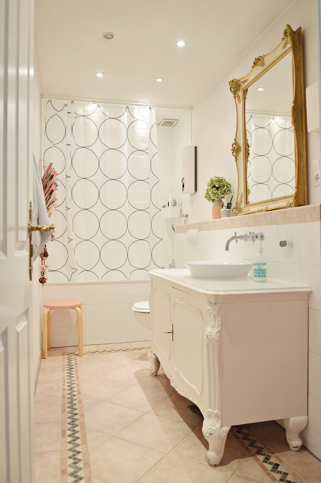 Small scandinavian bathroom in Dusseldorf with a vessel sink, furniture-like cabinets, white cabinets, an alcove tub, a shower/bathtub combo, white walls, terra-cotta floors, ceramic tile and a shower curtain.