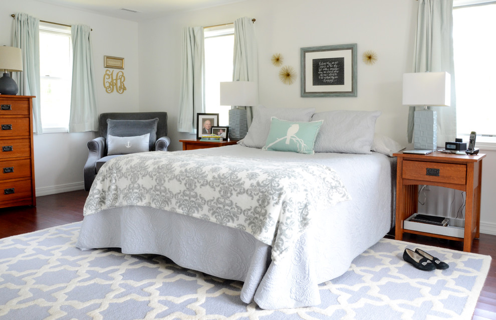 Example of a transitional bedroom design in Boston