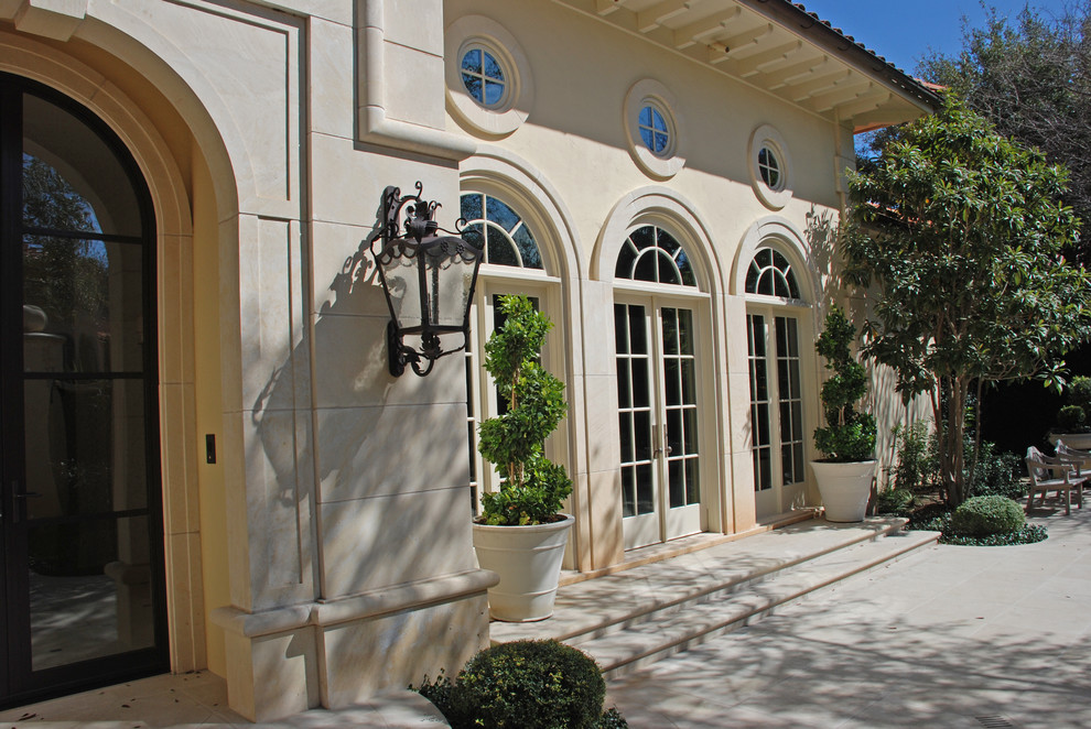 Inspiration for a mediterranean stucco exterior in Austin.