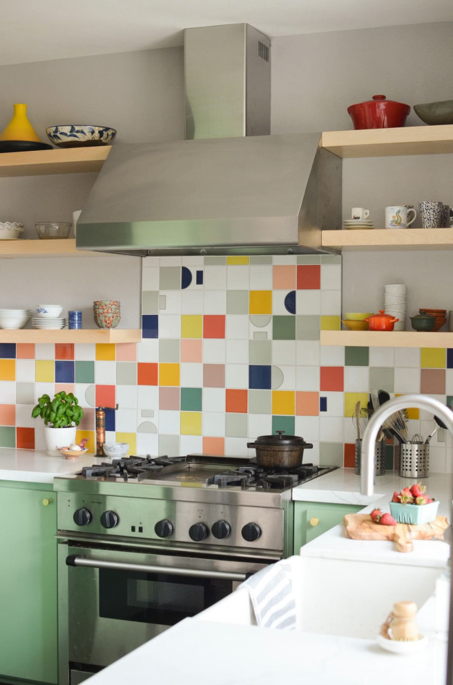 Example of a small eclectic single-wall kitchen design with turquoise cabinets, multicolored backsplash, ceramic backsplash and white countertops